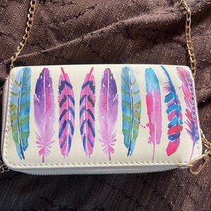 Cross body clutch.